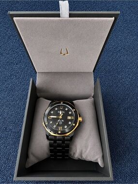 Bulova Black and Gold Ceramic Dress Watch with Crystal Accents